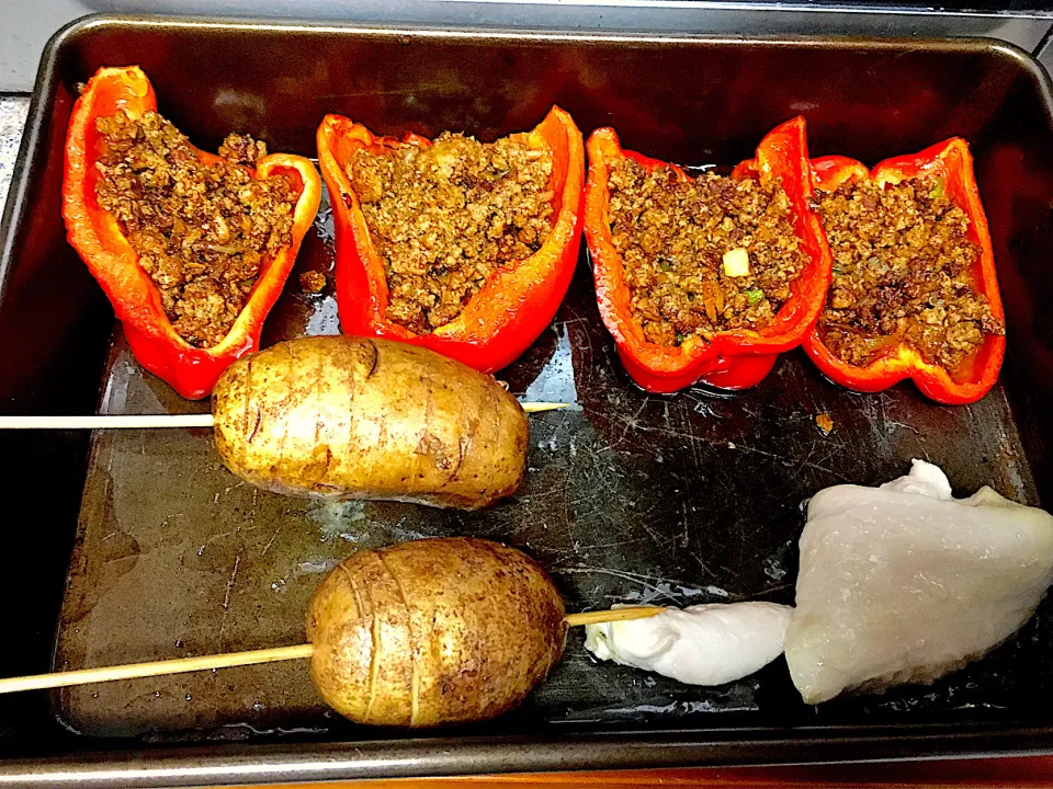 Snapdishの料理写真:Stuffed Bell Peppers, Baked Potato, Chicken Breast|Michaels Culinary Adventuresさん