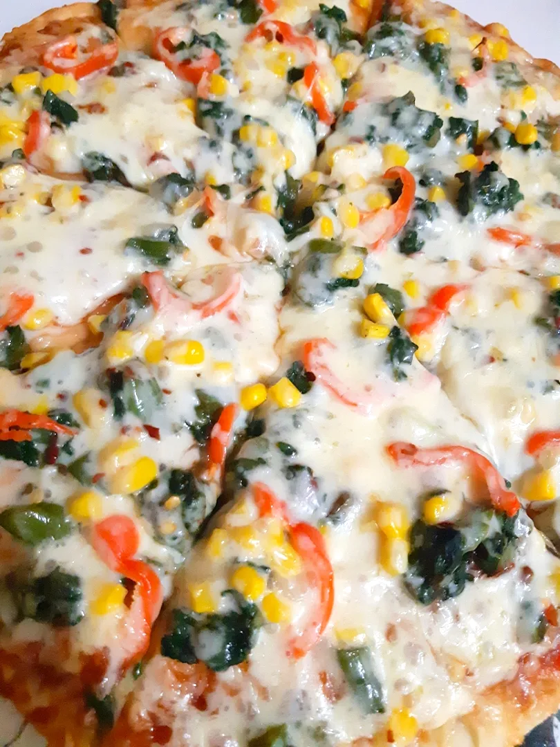 chickpeas chicka's dish Rasta pizza with callaloo, corn and red flavor peppers|chickpeas chickaさん