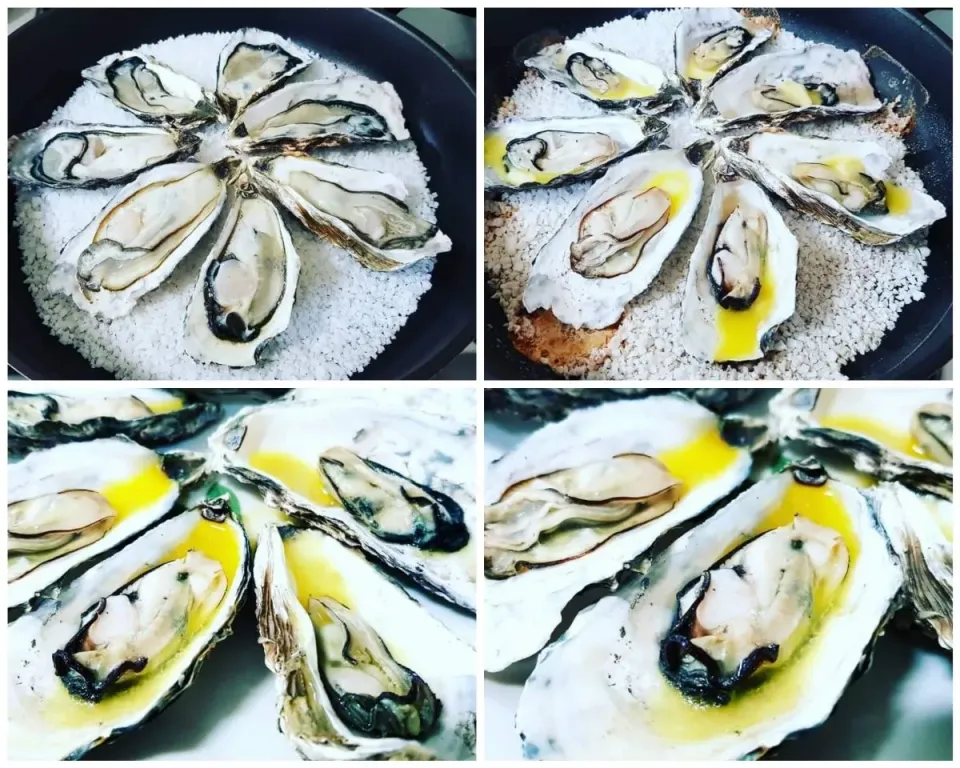 grilled oysters in half shell over coarse salt|steven z.y.さん