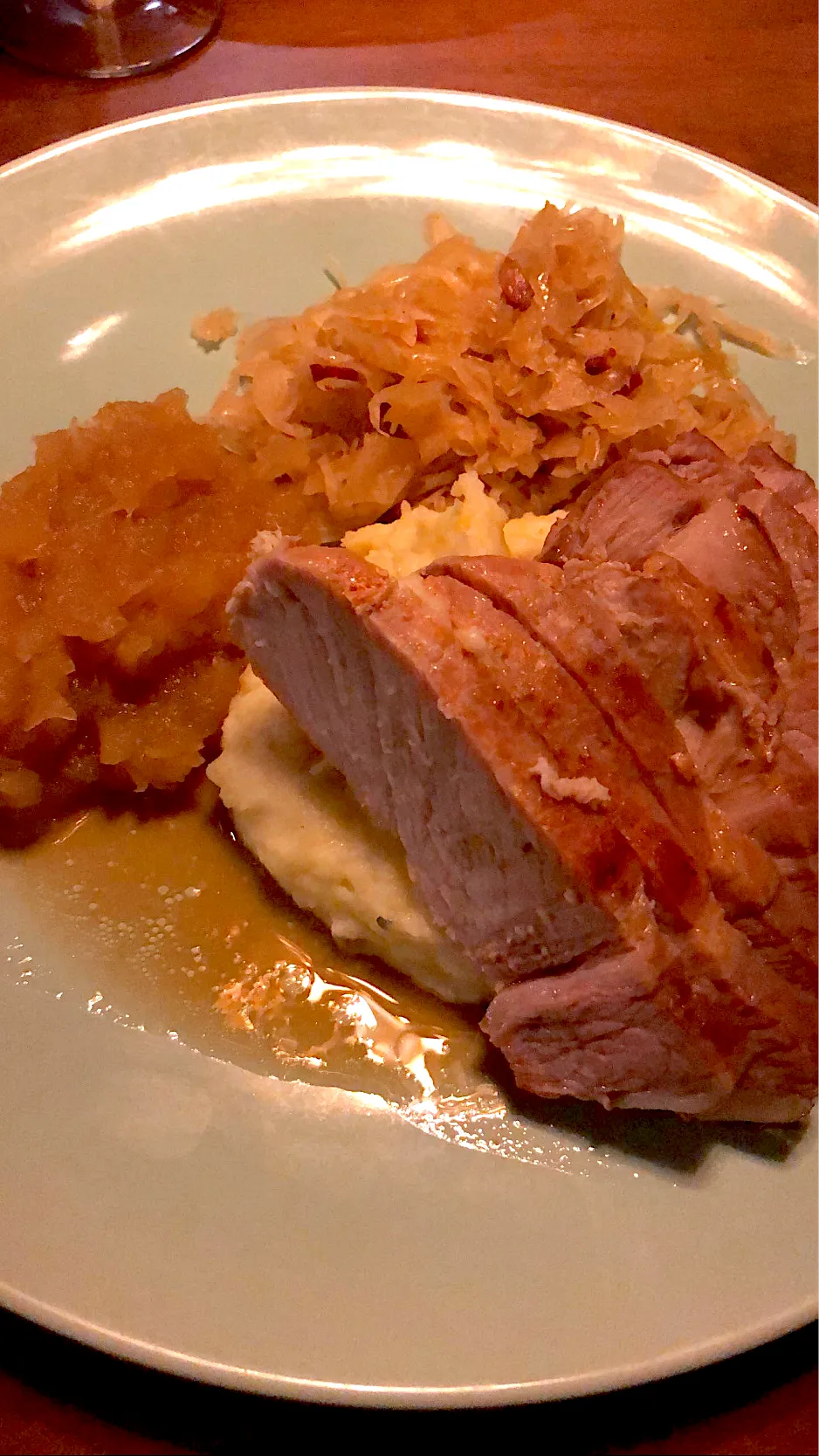 Traditional German New Years meal. Pork Chop au jus with guyere mashed potatoes and home made sauerkraut and applesauce|Chris Shannonさん