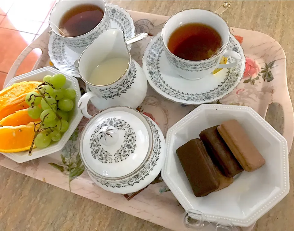 Snapdishの料理写真:Tea time fruits and Tim tam|Babyluv Cabrera Ocampoさん