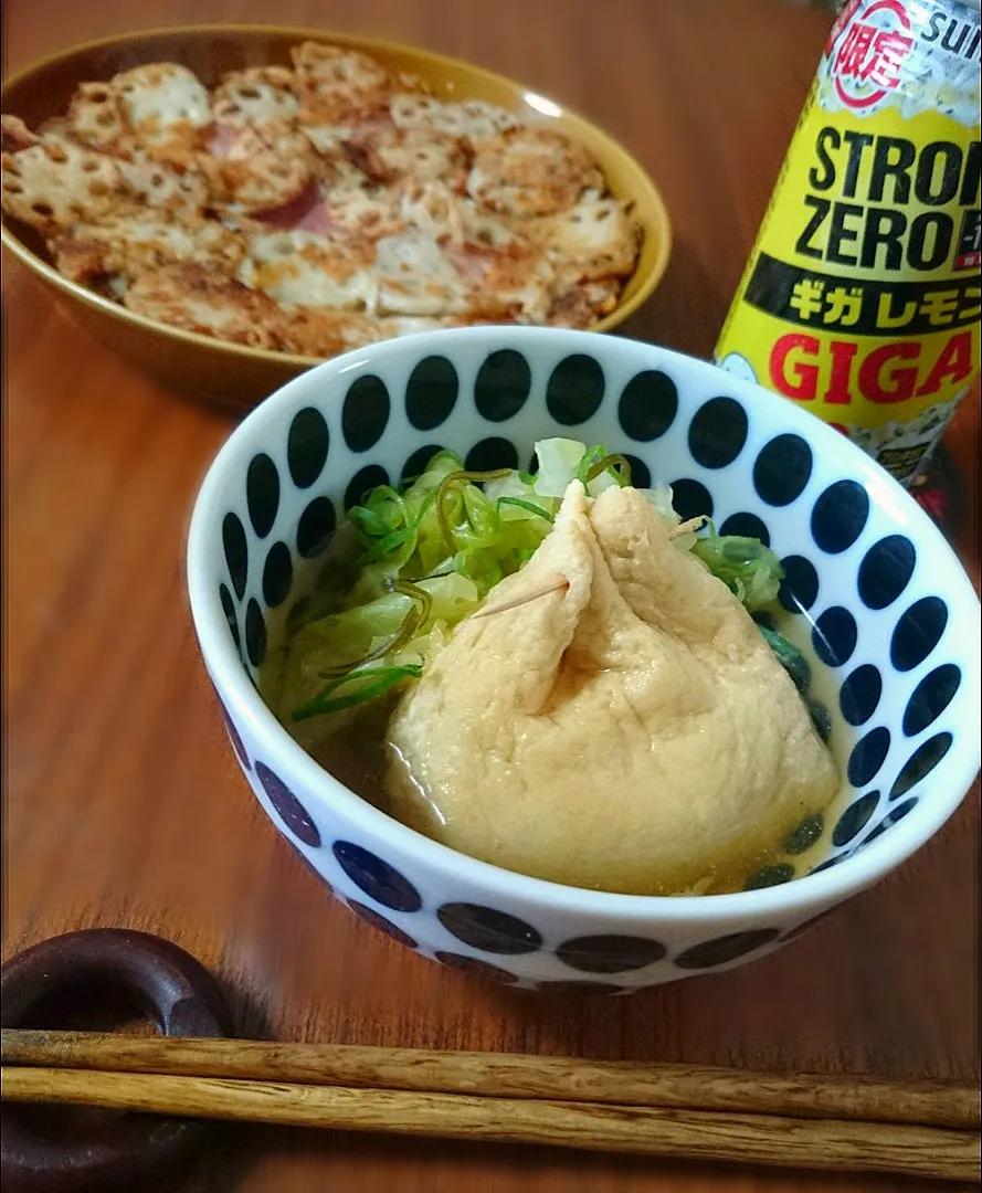 Snapdishの料理写真:巾着卵とｷｬﾍﾞﾂの煮物|まりおさん