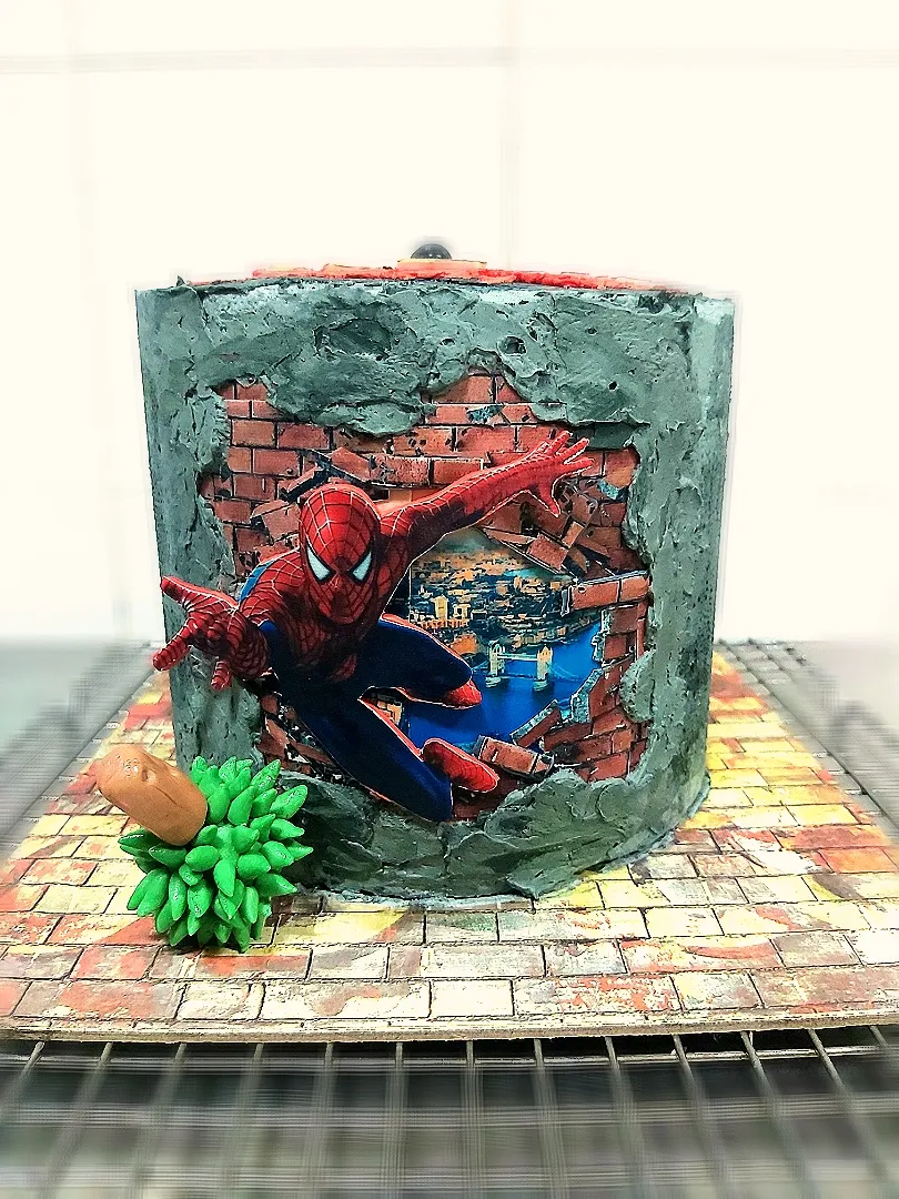 Spiderman Cake

Made of 1 kg Hershey chocolate sponge. Layered with hazelnut ganache and hazelnut crunchies. Frosted in hazelnut swiss buttercream.

|zakicakesさん