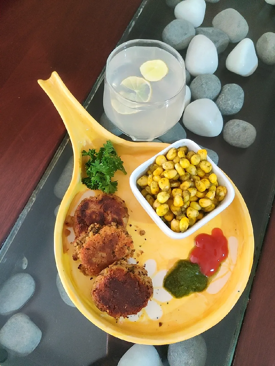 Snapdishの料理写真:Corn with a twist n Alu tikki !|lax14さん