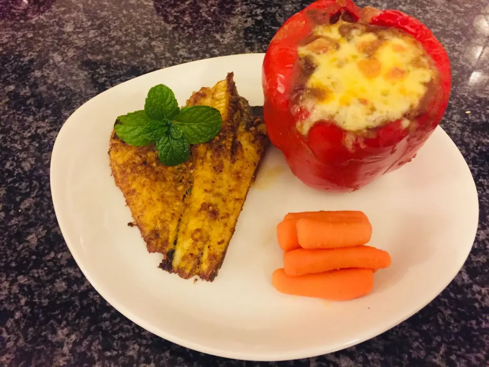 Stuffed bell pepper with cheese ontop with Baked baby hake and baby carrots|China☺️さん