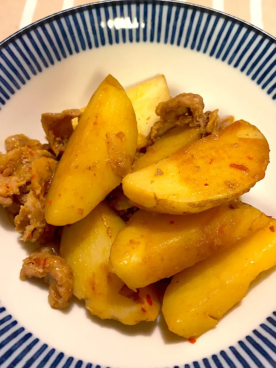 Snapdishの料理写真:新じゃがと豚こま肉の辛味炒め|トモさん