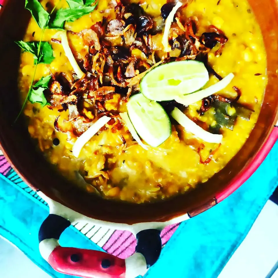 Haleem

Haleem is a type of stew popular in the Middle East, Central Asia, and the Indian subcontinent. Although the dish varies from region to region, it optionally includes wheat or barley, meat and lentils. Wikipedia

Variations: Hyderabadi haleem, Khichra, Harees

|Farhaさん