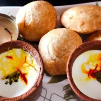 Snapdishの料理写真:kadhi kachori with lassiii|Poonamさん