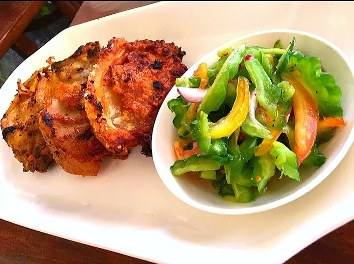 Snapdishの料理写真:Breaded Pork Chop and Bittermelon Salad|Joy Loniniaさん