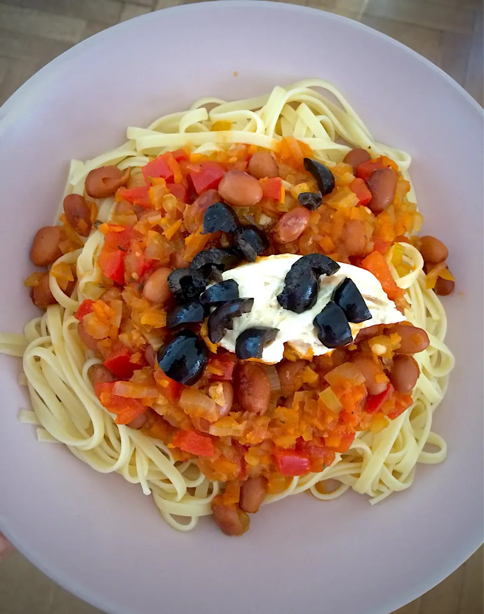 Pasta with a tomato and bean sauce, hummus and olives|MissYumYumさん