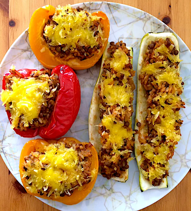 Stuffed bell peppers and zucchini with rice and lentils topped with vegan cheese|MissYumYumさん