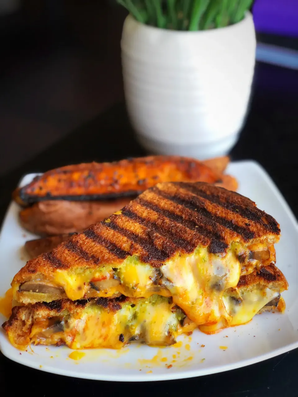 Snapdishの料理写真:Pesto Portabello mushroom grilled cheese with sweet potato steak fries.|WholeLivingLargeさん