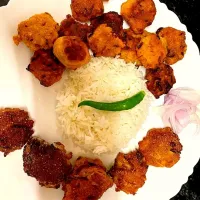 Daal er bora (Red Lentil Fritters); Maacher dim Bora(fish roe fritters); Rice|Bengali Soul Foodさん