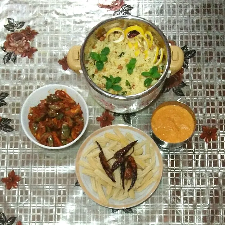 Lemon Rice, Spicy Brinjal, Parapu Tovayal with rice fries and dry sour chili fries. Trully 100% vegetarian|Anu's Foodiesさん