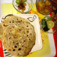 Snapdishの料理写真:Aloo paratha,Alur Dom,Boondi rayta, Dhanepata chatni|priya ashさん