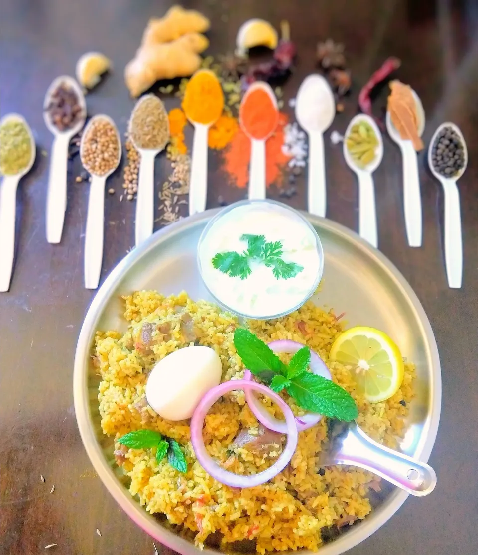 # Dindukkal thalapakkatti mutton biriyani with cucumber yogurt and egg .|nivedhasankar64@gmail.comさん