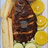 Home grilled #tilapia fish served with chips and salad|foodiz dropoffさん