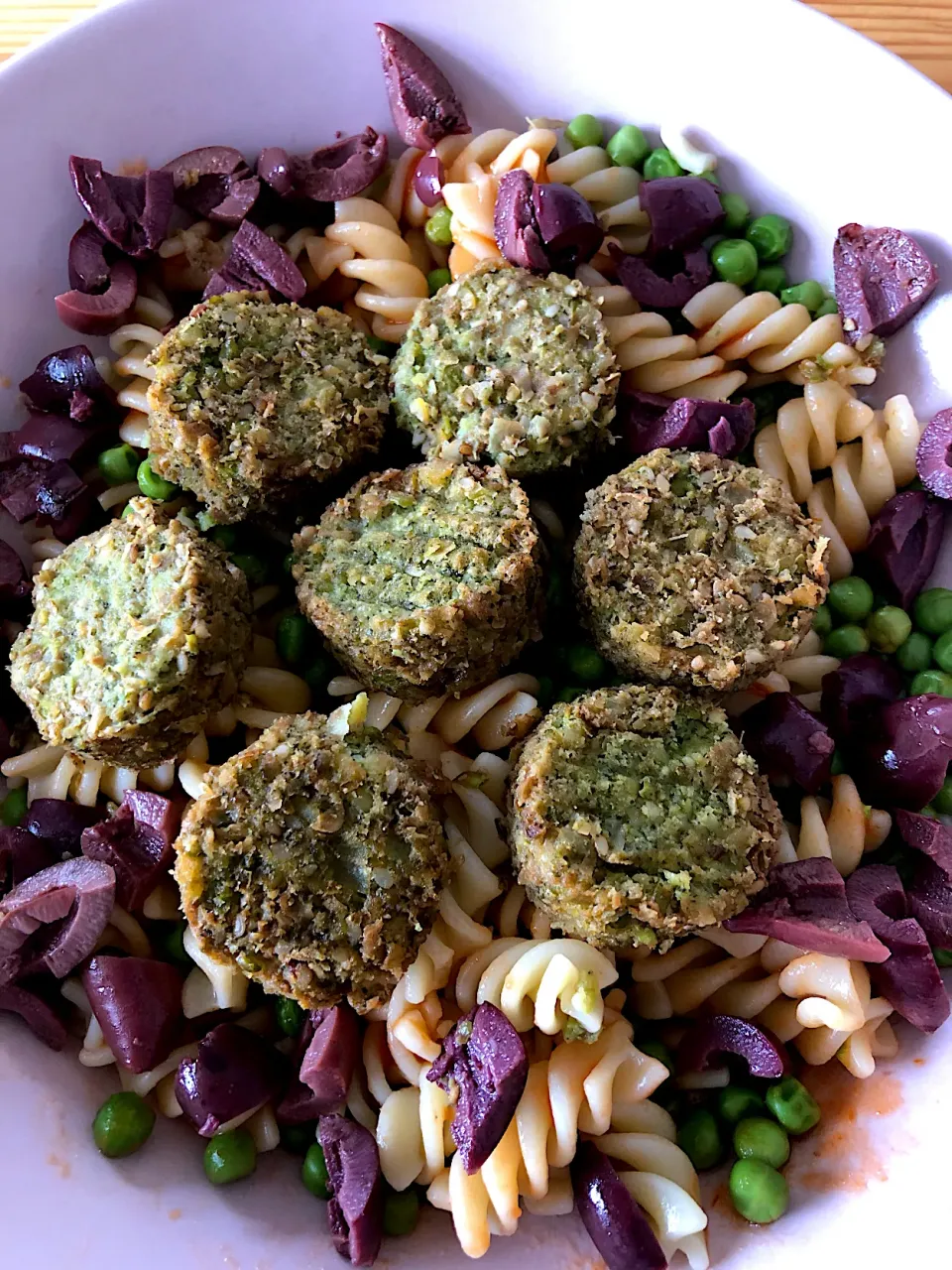 Pasta with peas, olives, falafel and tomato sauce|MissYumYumさん