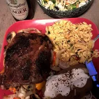 Pan seared wagyu beef sauteed mushrooms onions and peppers chicken fried rice and a baked potato with sour cream and habanero and jalapeno cheese and a salad wi|Lou S. Alexanderさん