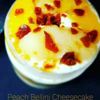 Peach Bellini  with peaches soaked in prosecco and crushed toffee.|Lifeさん