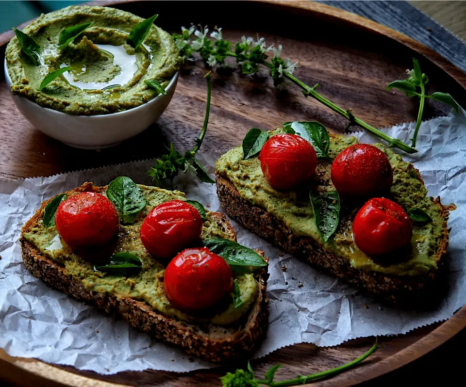 Homegrown basil hummus with oven roasted tomatoes on seeded sourdough|Misstyさん