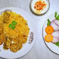 Snapdishの料理写真:chicken Biriyani with raita and salad|Arpita Rahaさん