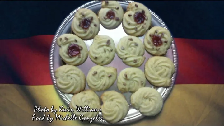 Snapdishの料理写真:Spritzer Cookies with Strawberry Jelly and Pecans|Pastry Chef Meshaさん