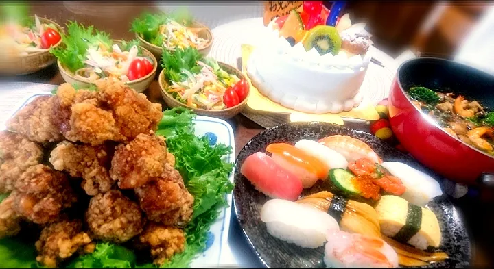 Snapdishの料理写真:唐揚げ  タワー🐔
  ごぼうサラダ🌱
  エビ🦐とマッシュルームのアヒージョ
         
  握り寿司🍣とケーキ🎂
  
  Happy   birthday 🎉|びせんさん