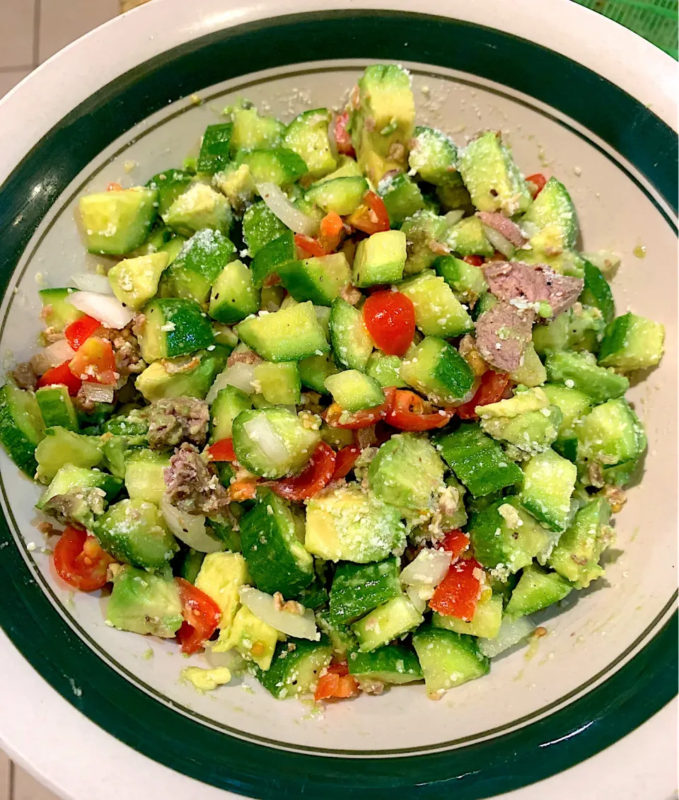 Snapdishの料理写真:Avocado 🥑 and Cucumber 🥒 Salad. With diced cherry tomatoes, chopped steaks, and bacon 🥓 for garnish. So yummy 😋|Alma's Home Kitchenさん