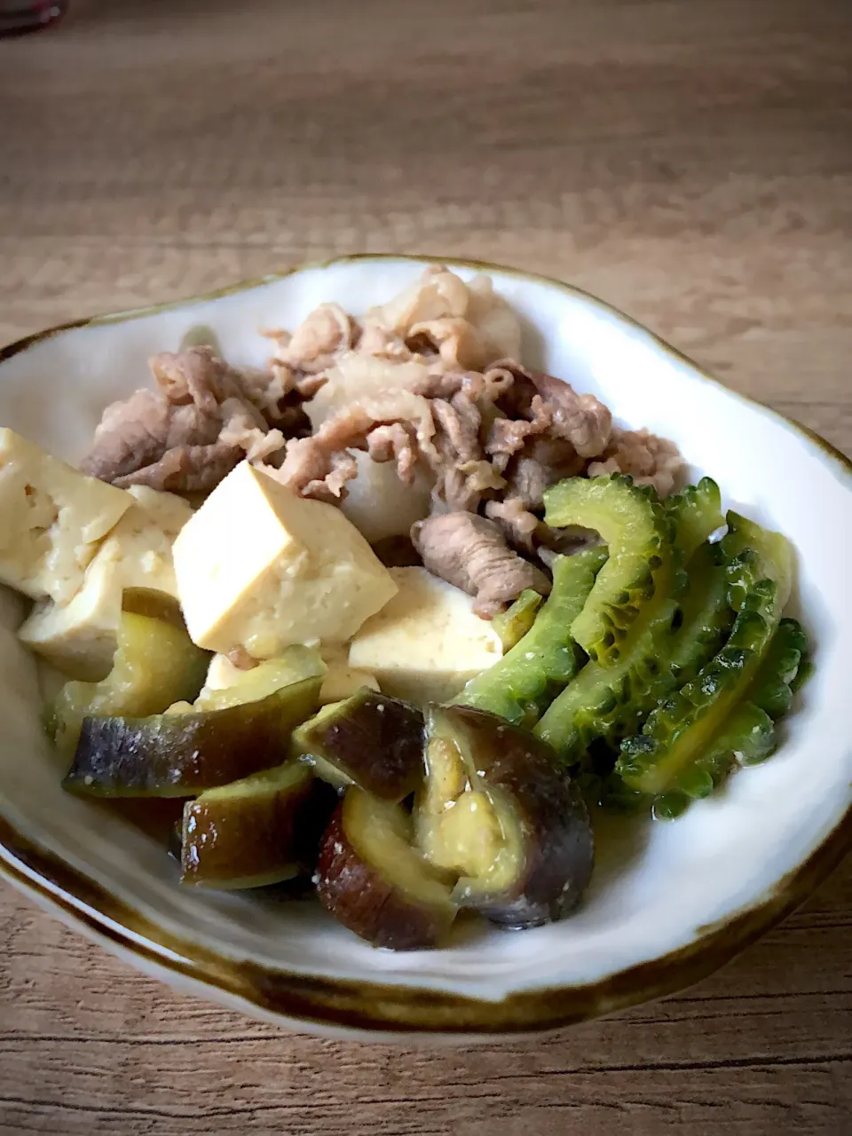 Snapdishの料理写真:ゴーヤと豚茄子豆腐の焚き物味噌仕立て|藤本 ひろきさん