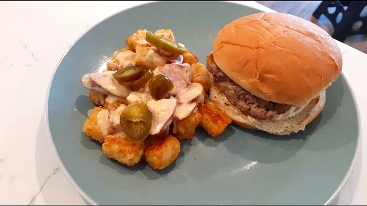 Snapdishの料理写真:Michael Jordan of the Kitchen's dish Turkey burger with tater tots and sausage gravy|Michael Jordan of the Kitchenさん