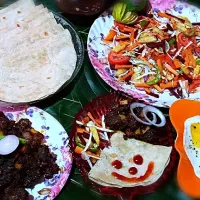 Snapdishの料理写真:Indian rotti and beef ularttiyat with salad and bullseye|Binija.m.sさん