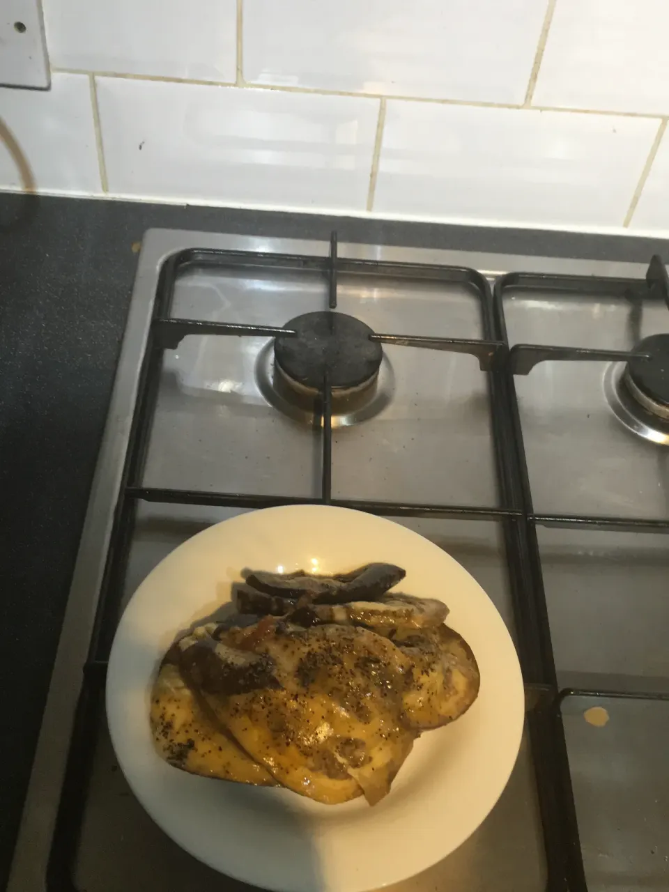 Grilled aubergine with Parmesan, cheddar cheese and garlic pepper corns.|Leona A Williamsさん