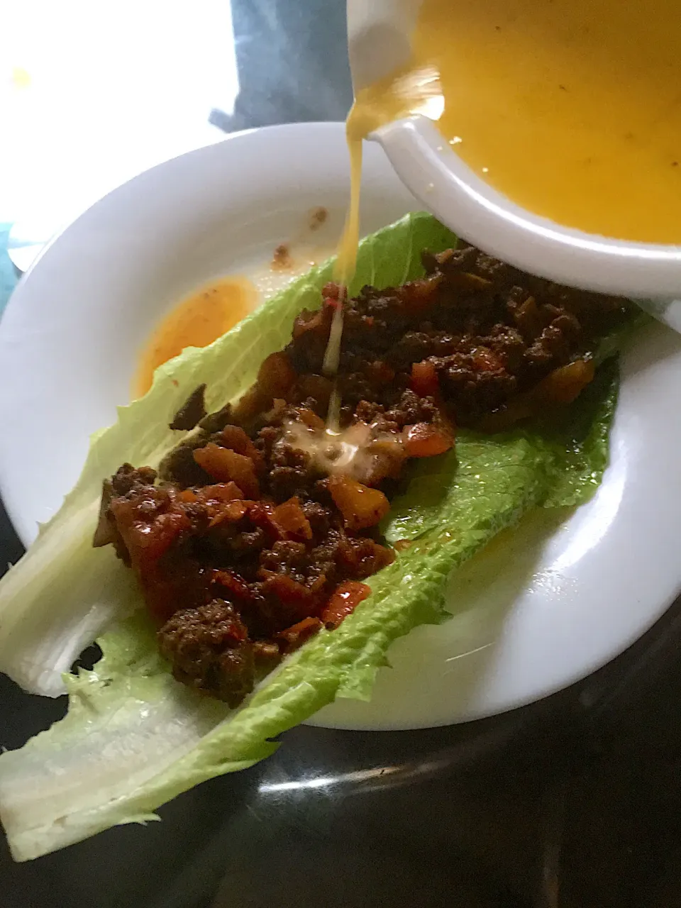 Tacos drizzled in cheese sauce on a bed of lettuce!|Leona A Williamsさん