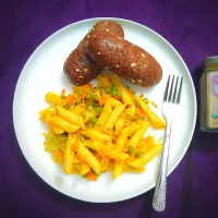 Snapdishの料理写真:Honey wheat brown 🍞 with salted butter on top , Indian style mixed vegetables Penne pasta 🍝|nivedhasankar64@gmail.comさん