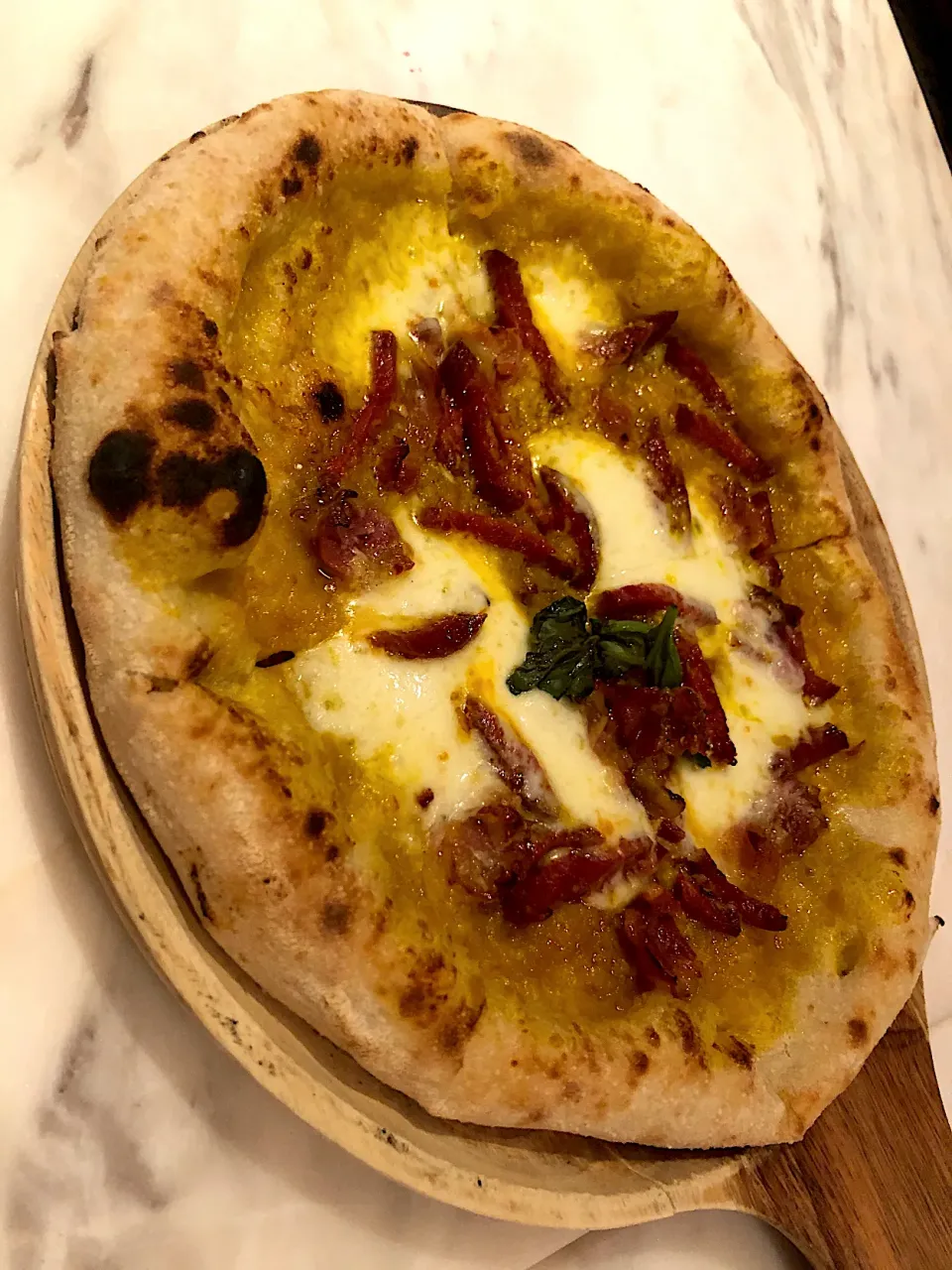 Snapdishの料理写真:Zucca, pumpkin pizza with pancetta and spice salame provolone cheese|ｖ（＾＿＾ｖ）♪さん