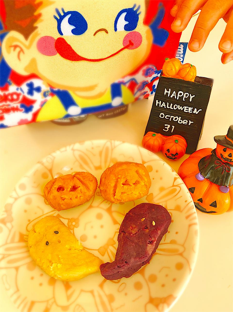 上から小さなおててが狙ってる♡かぼちゃとおばけの仲良し巾着。
