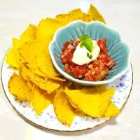 Snapdishの料理写真:Tortilla Nacho with salsa & sour cream|Jill Nyomanさん