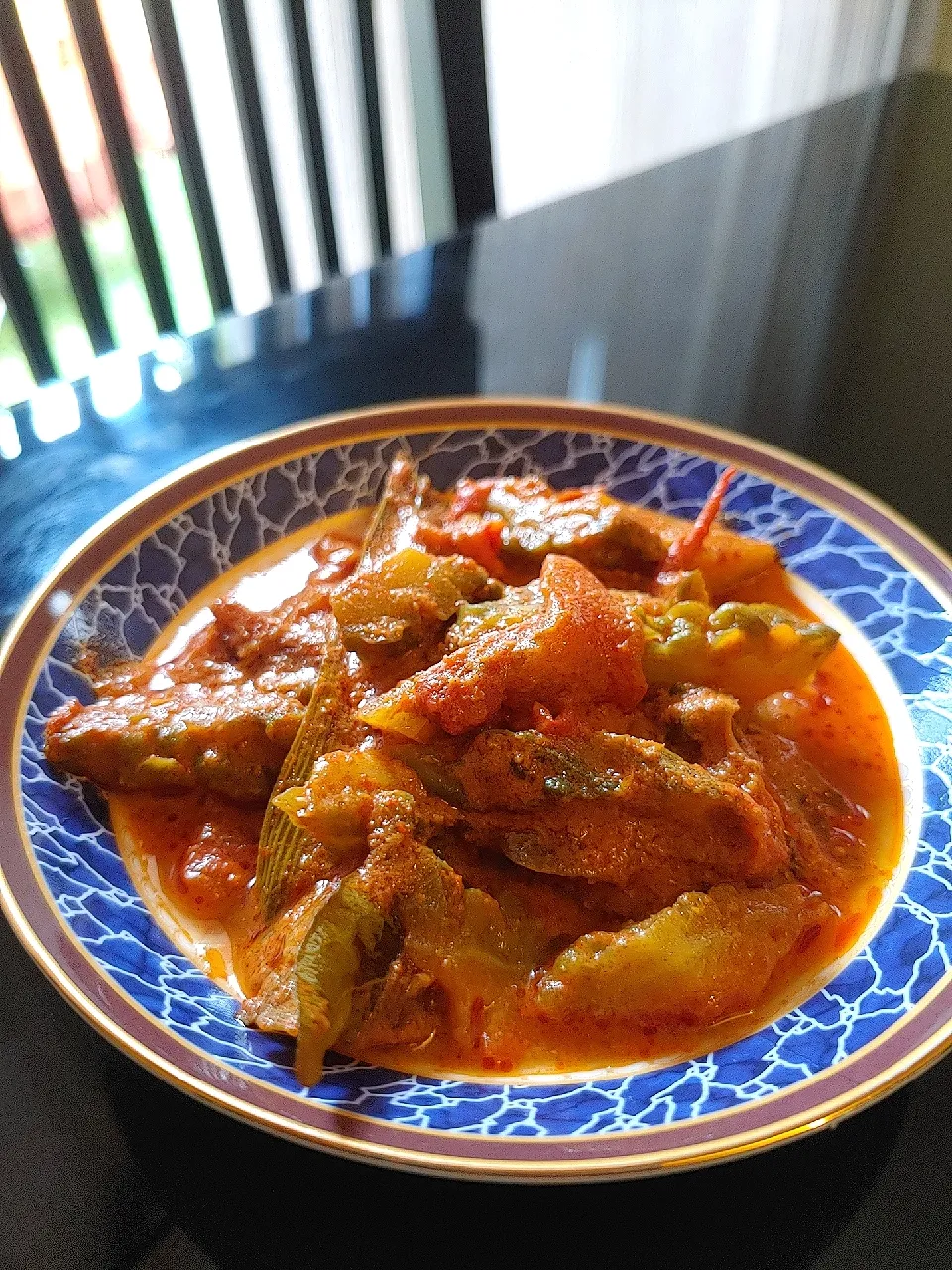 Snapdishの料理写真:Sour bittergourd curry|Nirmani Jayawardanaさん