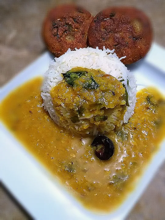 Snapdishの料理写真:yellow lentil an rice with potato cutlet👌💞|hina jibranさん