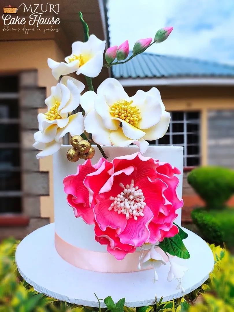 Beautiful cake for a loyal client...call/WhatsApp for all your cake orders.|mzuriさん