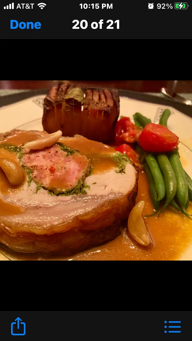 Roast Pork Stuffed with a Pork Farce and Pesto with a Mustard Roasted Garlic Sauce Herbed with Herbed Potatoes and Green Beans|Christine pavelkaさん