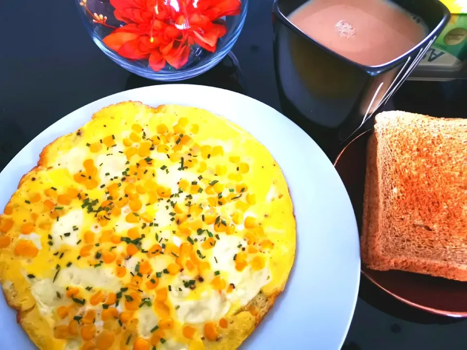 Snapdishの料理写真:Corn Cheese Omelette for breakfast|Sub-Recipesさん