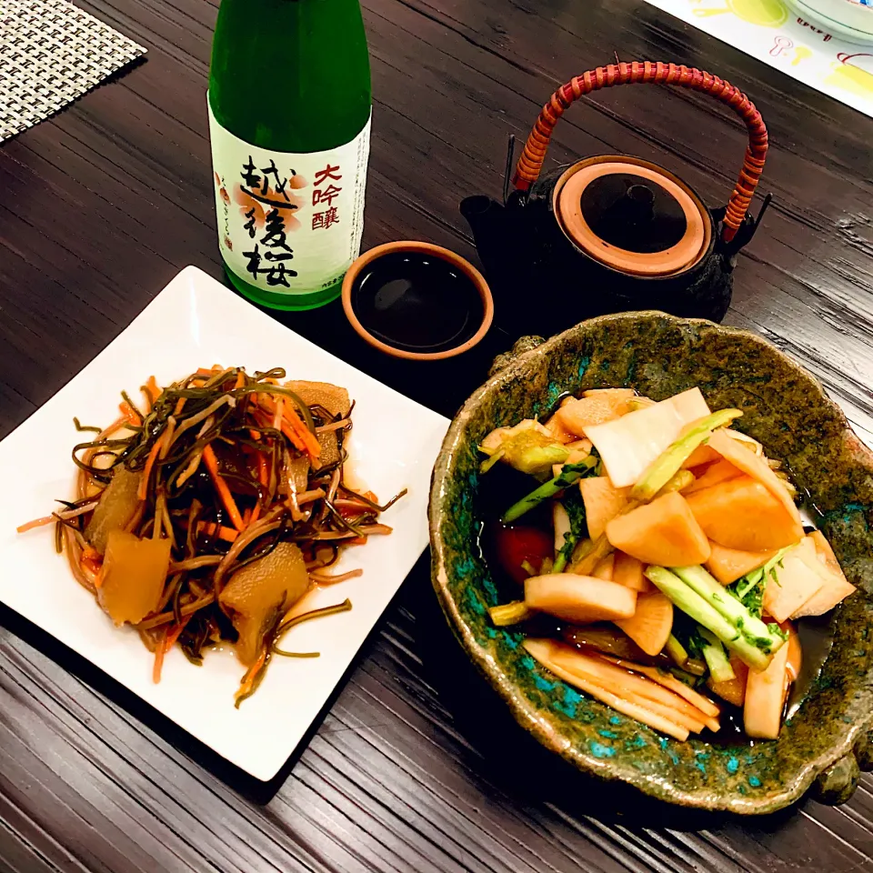 松前漬けと大根の酢醤油漬けと日本酒😋|ぽくくんさん