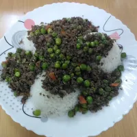 Snapdishの料理写真:Rice with beef and pee recipe|Abdoさん