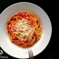 Spaghetti with  black olive, tomato "ciliegino", and salted ricotta... Italian food style|Ivan4760さん