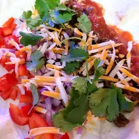 smoky mojo ,tacos epicure spices with black beans,  onion,  peppers, cheese, salsa, cilantro|Leahさん