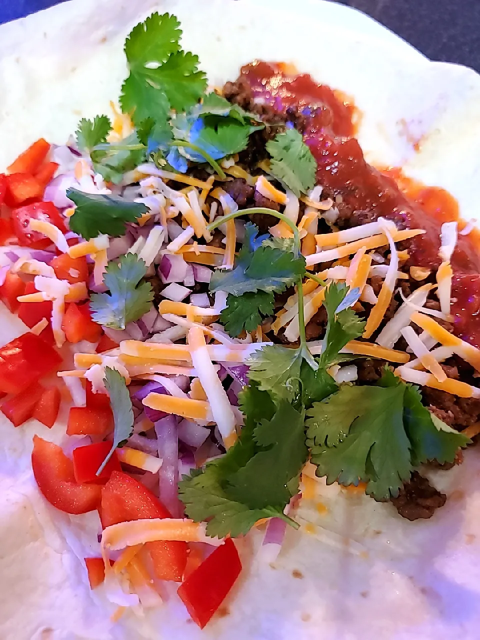 smoky mojo ,tacos epicure spices with black beans,  onion,  peppers, cheese, salsa, cilantro|Leahさん