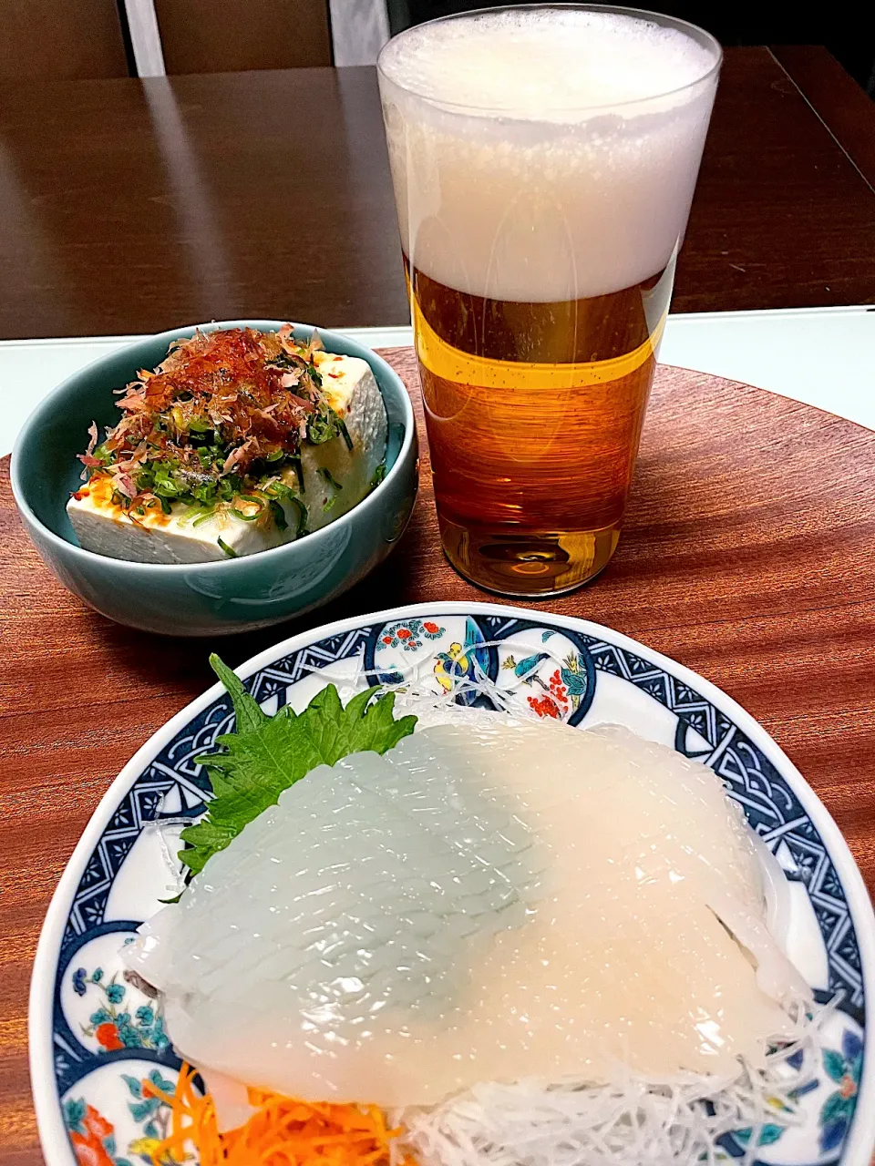 烏賊のお造りと生ビール🍺|流線形さん