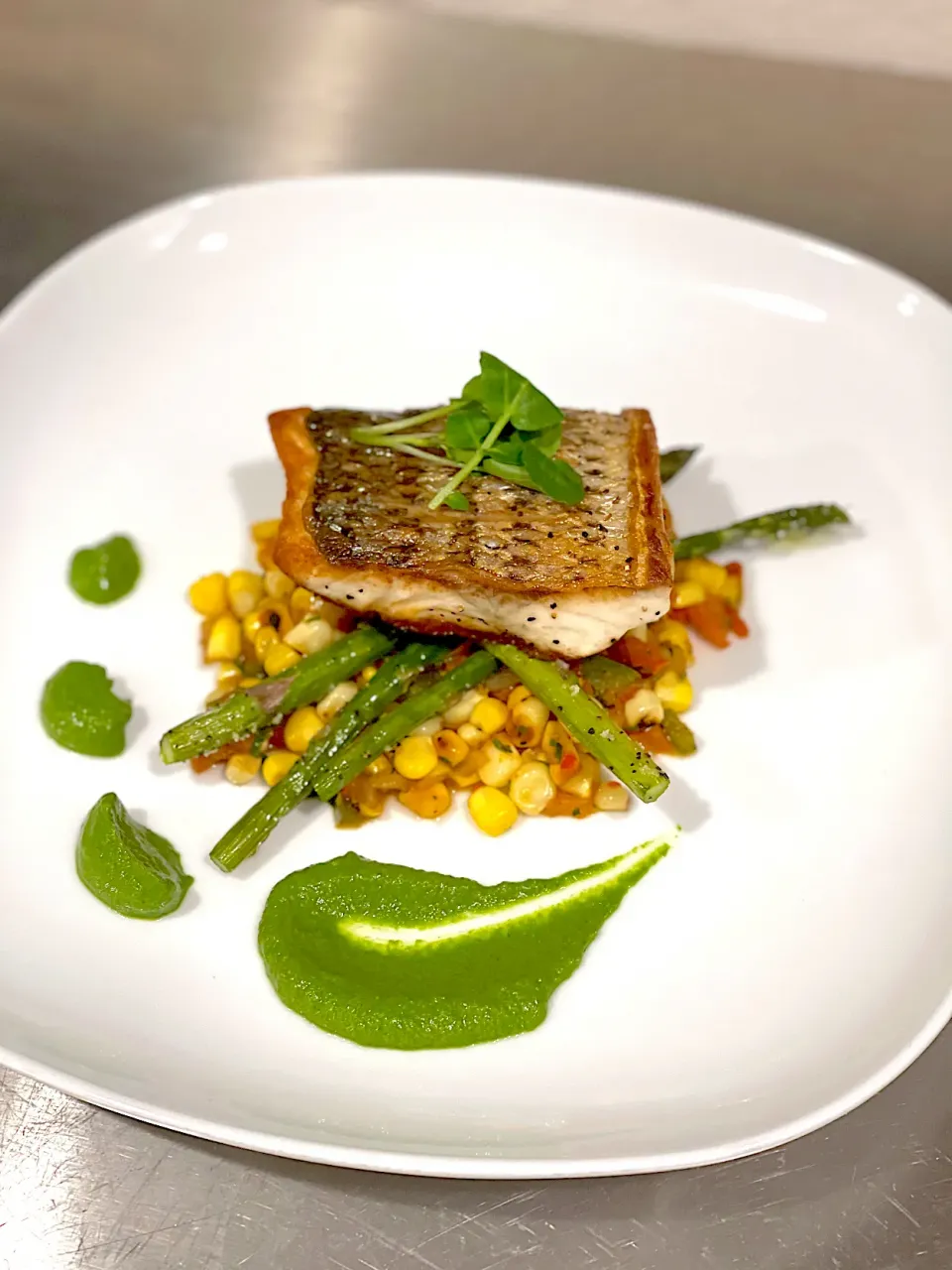 Pan seared striped bass with grilled corn salsa and basil herb purée|jeffさん